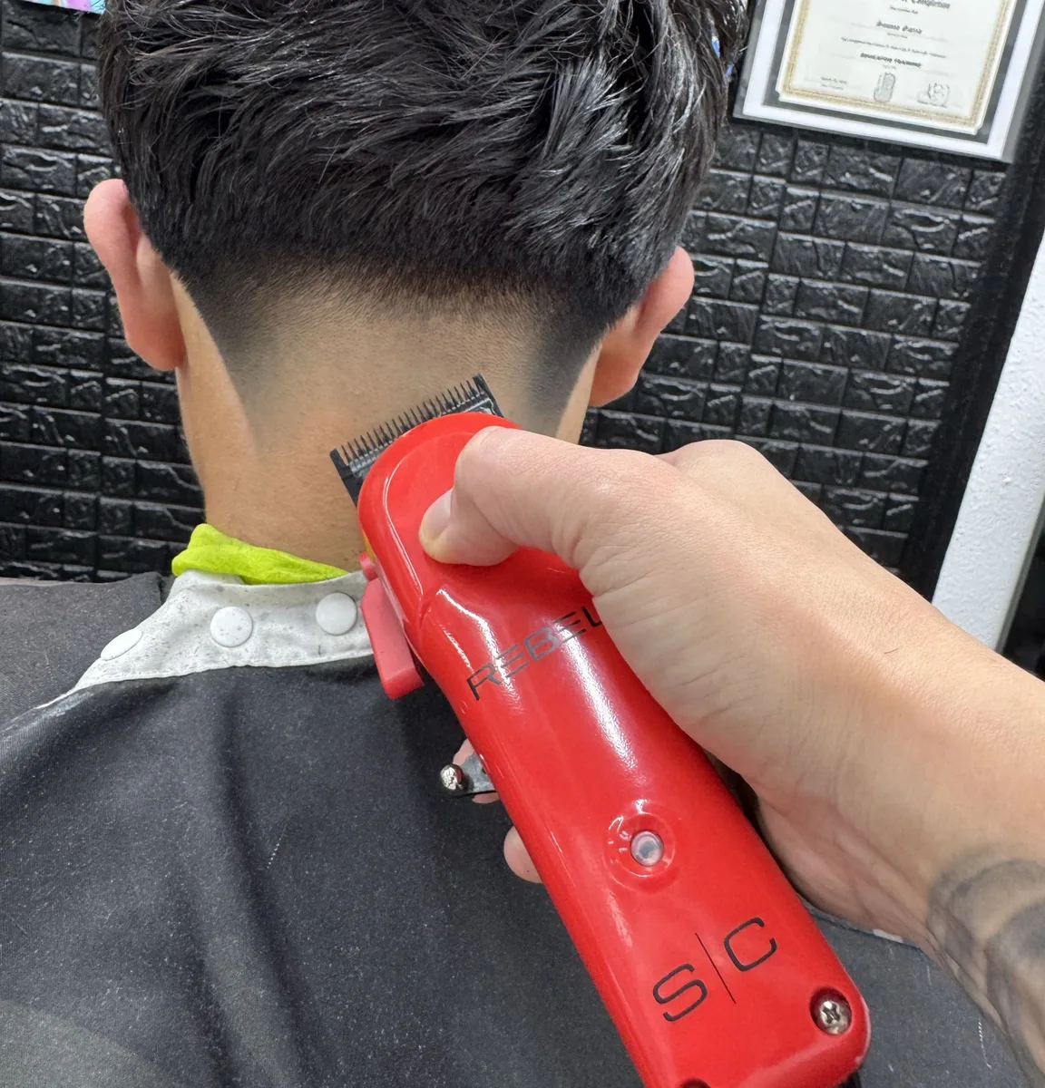 Detail work with clippers at the shop